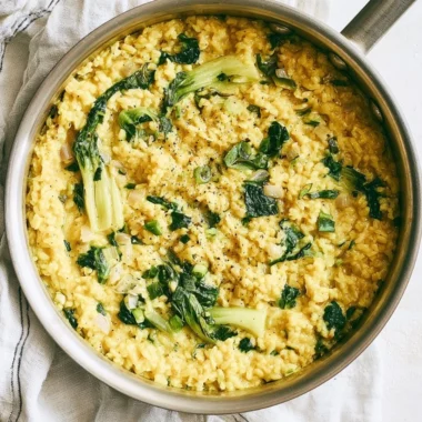 Creamy coconut rice served in a bowl with herbs and spices for anti-inflammatory benefits