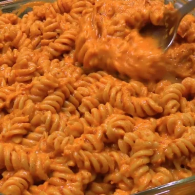 High protein creamy tomato pasta with fresh herbs and cheese