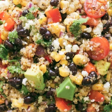 Delicious quinoa black bean salad with fresh vegetables and dressing