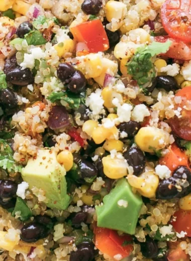 Delicious quinoa black bean salad with fresh vegetables and dressing