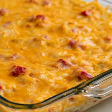 Delicious Super Cheesy Ham and Potato Casserole topped with gooey cheese