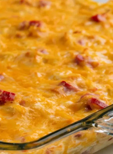 Delicious Super Cheesy Ham and Potato Casserole topped with gooey cheese